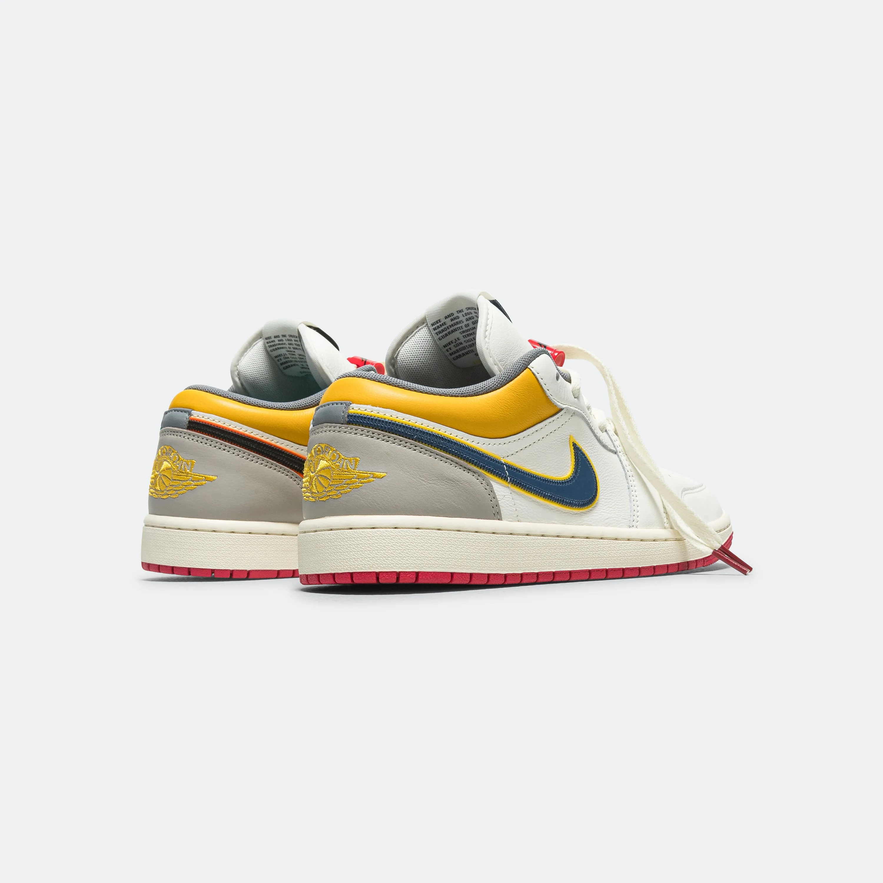 Air Jordan 1 Retro Low PRM - Sail/Brave Blue-Cashmere